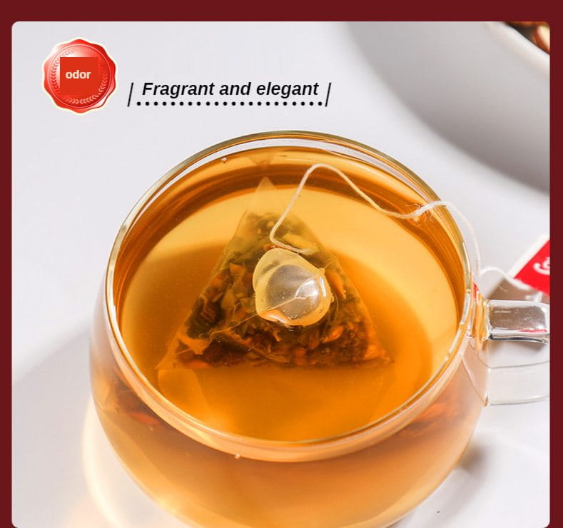 Glass teacup with tea bag showcasing Slimming Tea Herbal Tea for health-enhancing herbal tea drinks