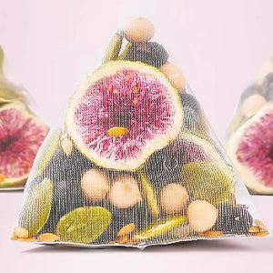 Triangular mesh bag of figs and nuts for Natural Progesterone Tea supporting menstrual cramps relief