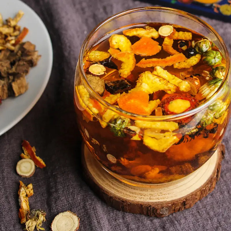 Herbal tea with Hovenia Dulcis Thunb, Tangerine Peel, and Volatile Oils in a glass