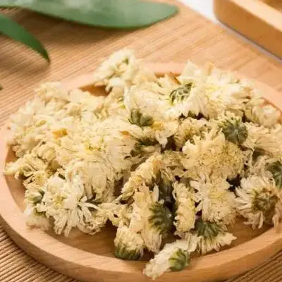 Dried chrysanthemum flowers in herbal tea for cramps alleviating menstrual pain and promoting blood circulation