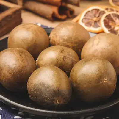 Round brown monk fruit from Siraitia Grosvenorii for cough relief in Lung Tea Herbal Tea
