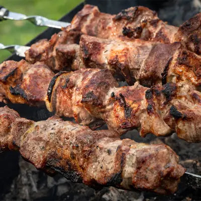Grilled meat skewers featuring Health-Enhancing Herbal Tea with Hovenia Dulcis Thunb and tangerine peel