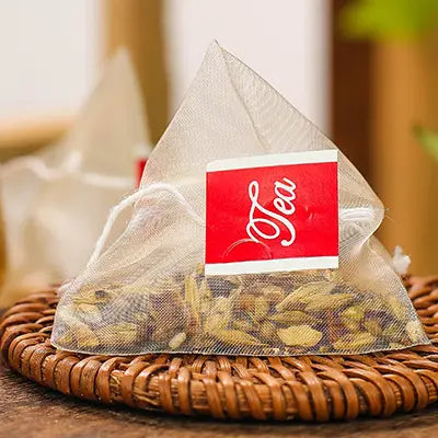 Pyramid-shaped tea bag from Red Bean Barley Tea supporting detox and expulsion with herb tea for detox