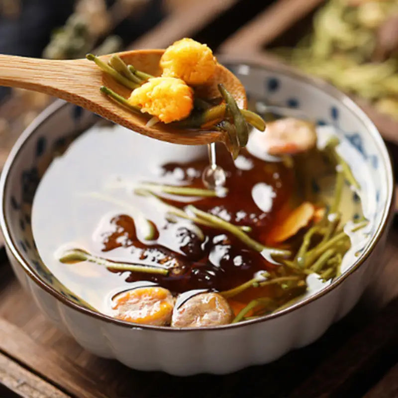 Floral tea in patterned bowl with siraitia grosvenorii for cough relief and health