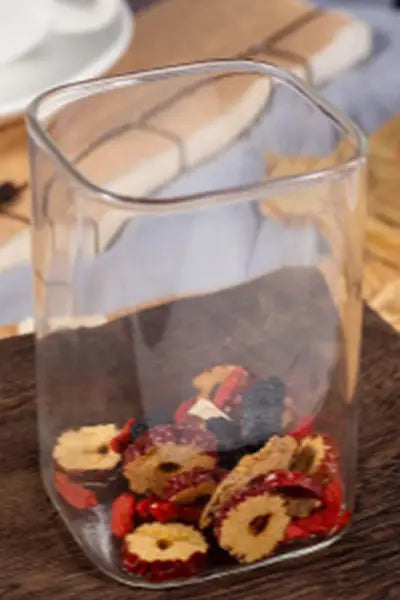 Square glass jar with dried fruit for kidney health and renal protection Herbal Tea