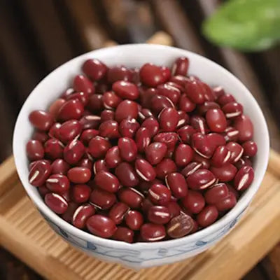 Bowl of red adzuki beans for supporting detox in herbal tea with tangerine peel for expulsion