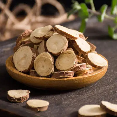 Sliced dried licorice root with hovenia dulcis thunb, tangerine peel, and volatile oils in herbal tea