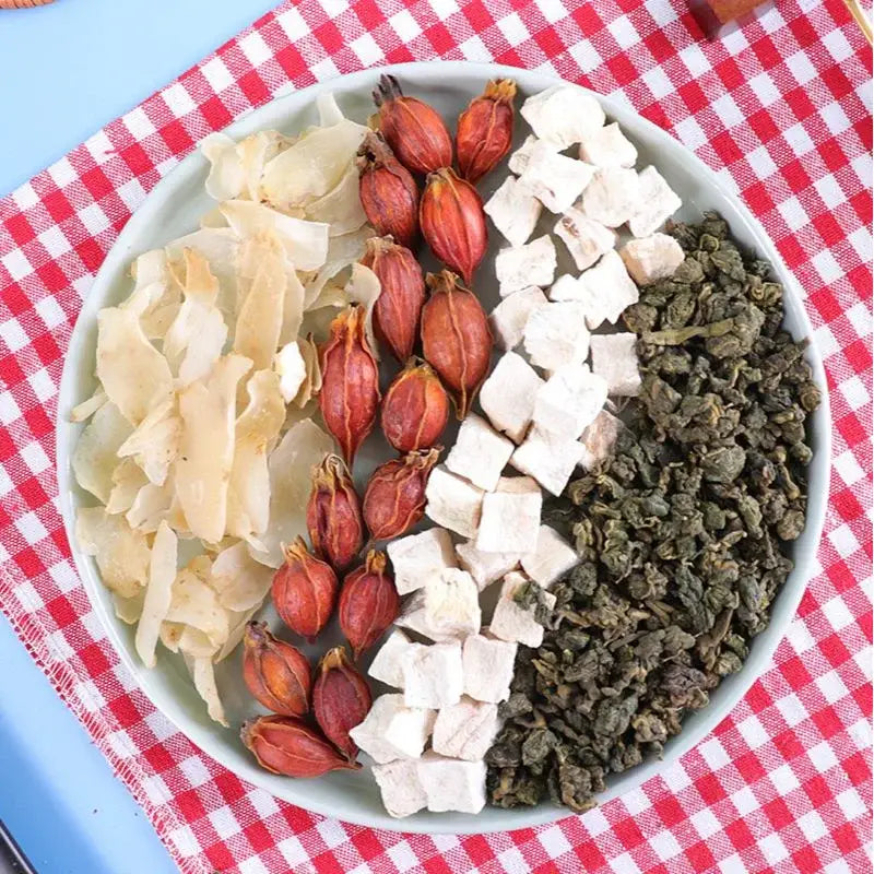 Assorted dried ingredients including Poria Cocos for Herbal Tea with antioxidant properties