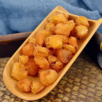 Dried longan fruit in Herbal Tea for Cramps promoting blood circulation and alleviating menstrual pain