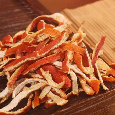 Dried orange peel strips in herbal tea supporting detox and expulsion from herb tea for detox