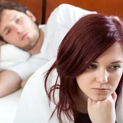 Pensive woman with auburn hair enjoying Gout Tea herbal tea with poria cocos and antioxidant properties