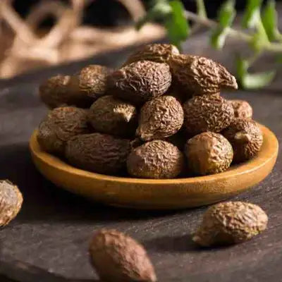 Wrinkled brown nuts from Lung Tea herbal blend with siraitia grosvenorii for cough relief